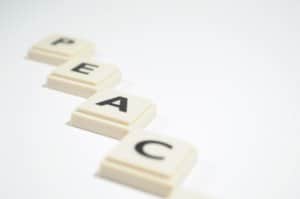 scrabble letters put together to form the world peace