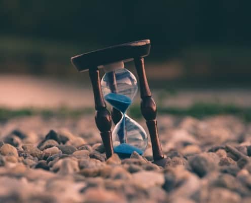A time glass in the ground
