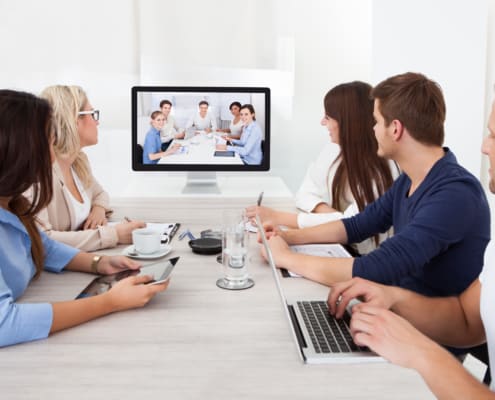 family sitting on a living room table