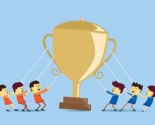 Children holding a golden trophy