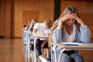 Students sitting in class and stressed