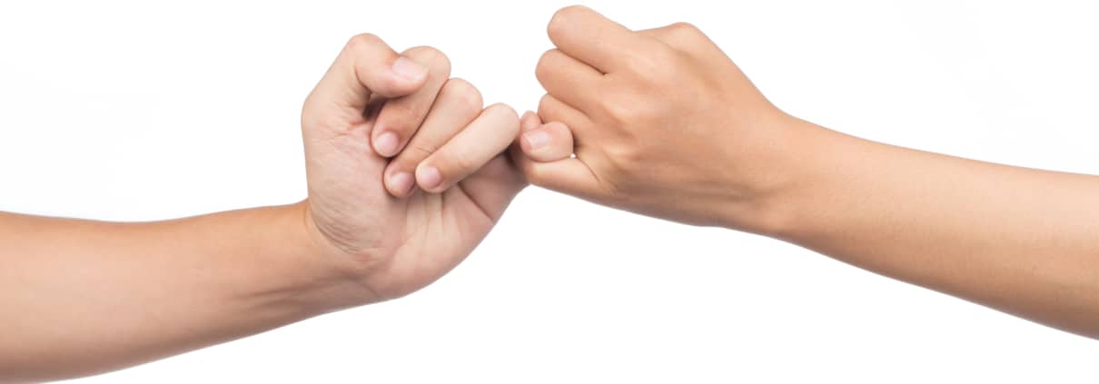 2 people making a pinky promise