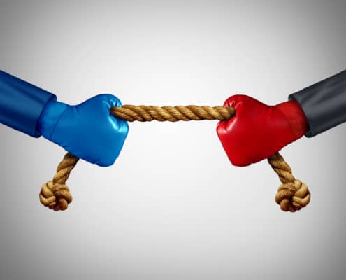 1 blue hand and another red hand pulling a rop