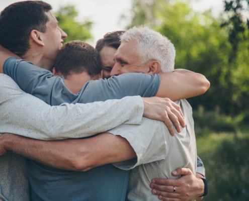 Family members hugging each other